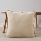 Camille Cushion, Natural by coffee table