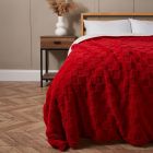 Checkerboard Throw with Sherpa, Red on end of bed