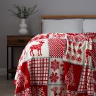 Christmas Winter Patchwork Throw, Red and White on bed