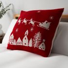 Father Christmas on Sleigh Reversible Cushion, Red and White on bed