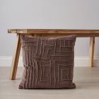 Genevieve Cushion, Taupe by coffee table