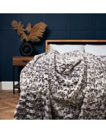 Animal Print Throw, Grey Styled On Bed