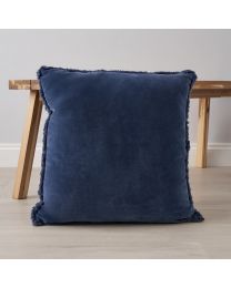 Camille Cushion, Navy by small coffee table