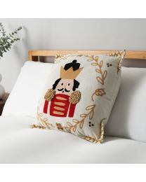 Christmas Nutcracker Cushion, Natural on bed