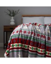 Christmas Stag Stripe Throw with Sherpa, Red & Green on bed