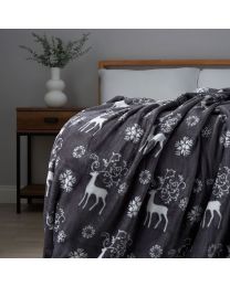 Christmas Stag Throw, Grey on bed