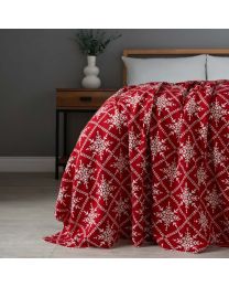 Christmas Traditional Snow Flake Reversible Throw, Red draped over foot of bed