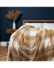 Luxury Warm Check Throw with Sherpa, Ochre Styled on Bed