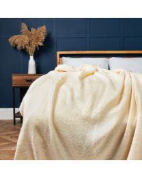 Meadow Fringe Throw, Cream Styled on Bed