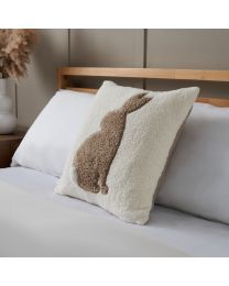 Tufted Bunny Cushion, Natural on bed